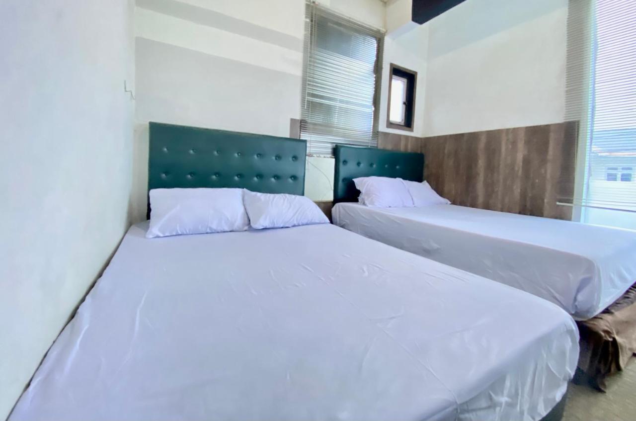 Homestay Batu Kelir Syariah Dieng Mitra Reddoorz Diyeng 外观 照片