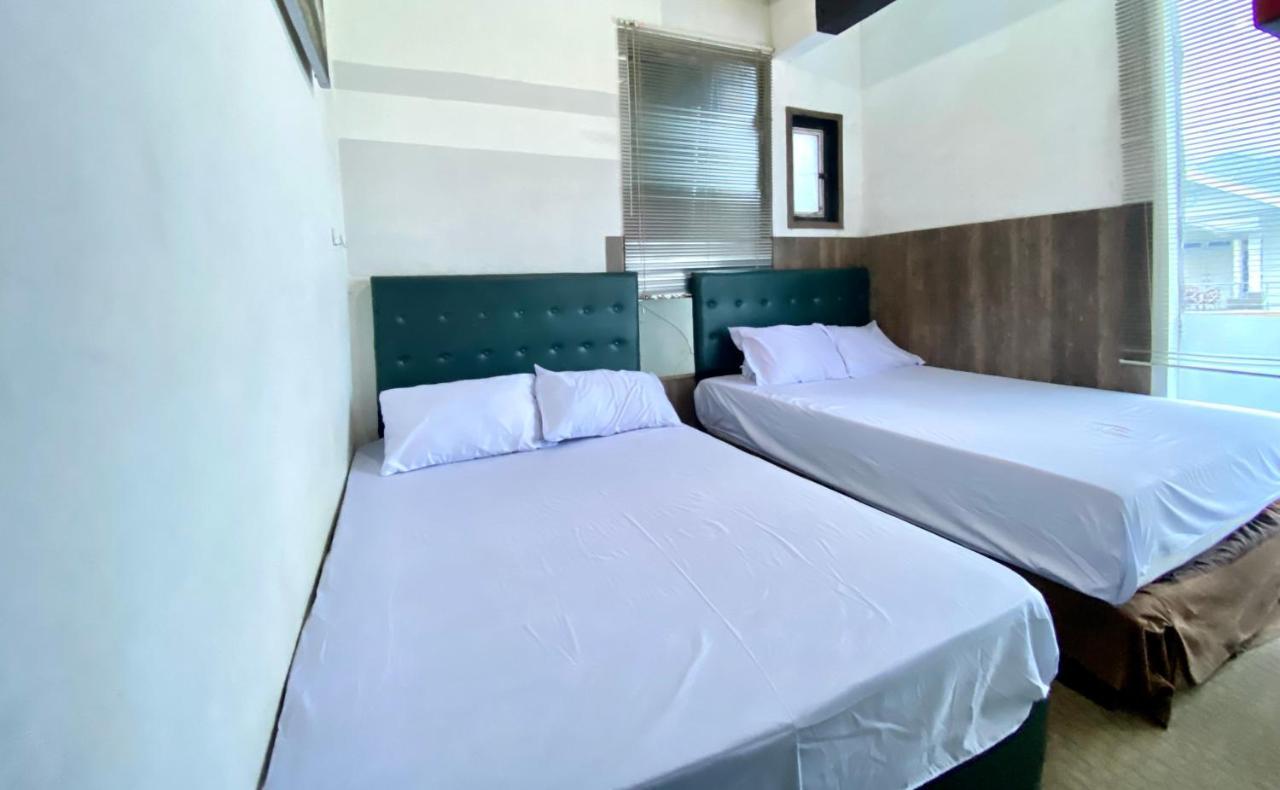 Homestay Batu Kelir Syariah Dieng Mitra Reddoorz Diyeng 外观 照片